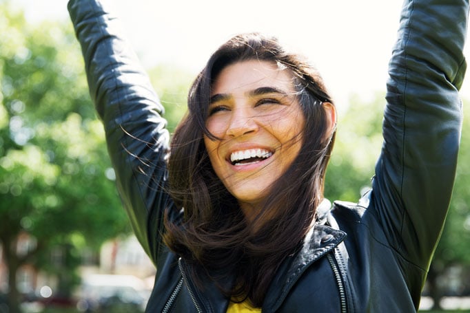 Woman with her arms in the air